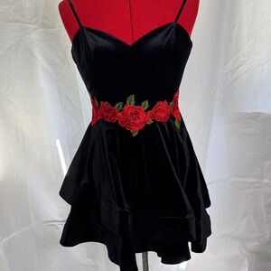 B. Darlin Elegant Black Mini Dress with Red Floral Accents and layered volume